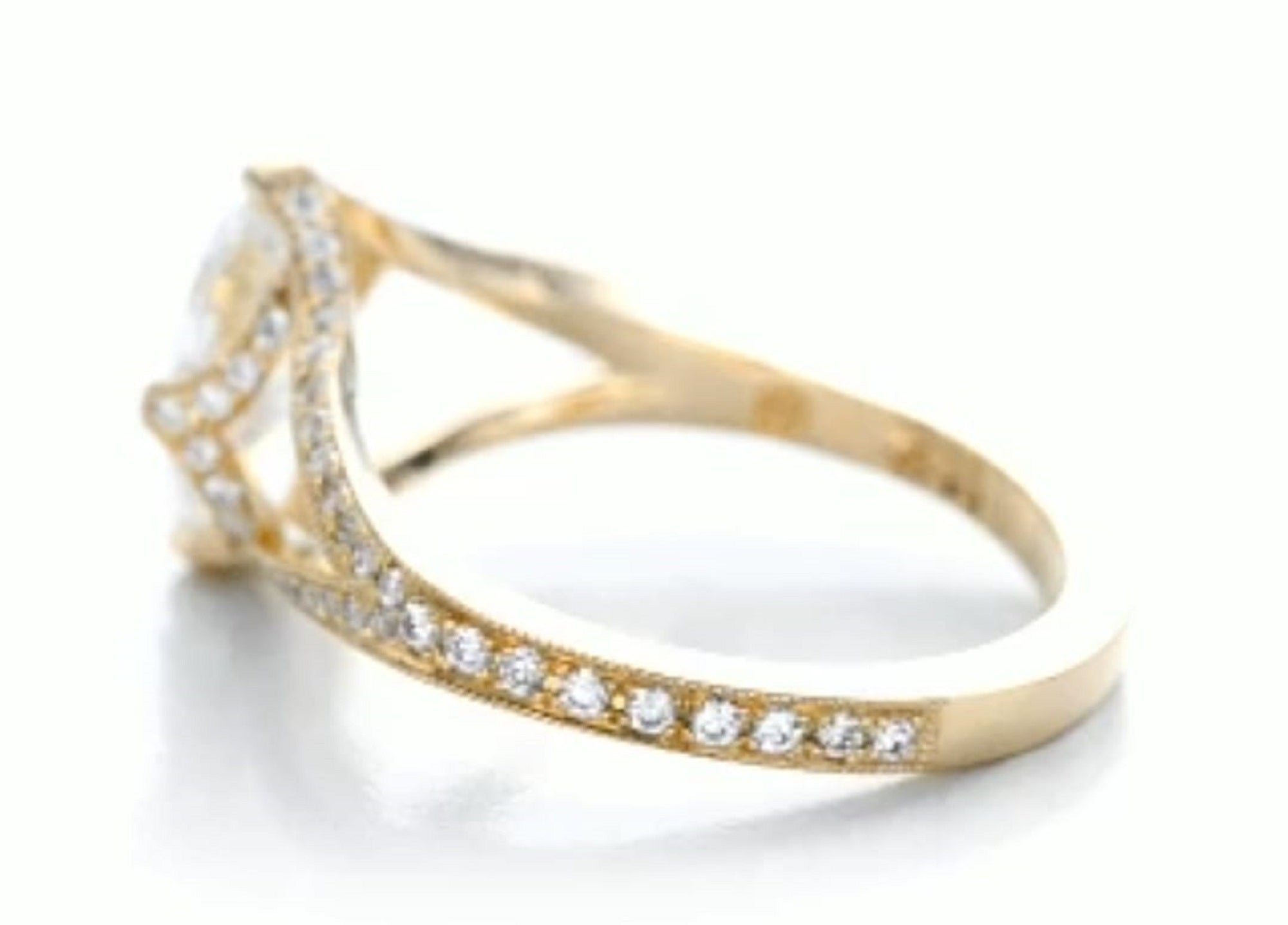 Close-up side profile displaying the pave-set diamond basket and cathedral split shank