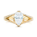 High-resolution top-down studio shot of 2 carat pear cut lab diamond ring