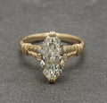 Direct top-down front view of a 4 carat marquise cut lab grown diamond ring.