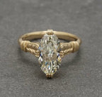 Direct top-down front view of a 4 carat marquise cut lab grown diamond ring.
