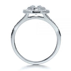 Side profile view of a 3 CT round lab grown diamond ring with bezel halo in white gold.