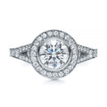 Direct top-down view of a 3 carat round cut lab diamond with bezel halo and split pave shank.