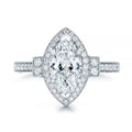 Studio top-down view of a 3 CT marquise lab diamond engagement ring on white background.