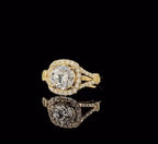 High-angle perspective view of yellow gold cushion halo ring with pave-set split shank.