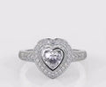 Direct top-down view of a 2 carat heart cut lab grown diamond engagement ring with bezel halo.