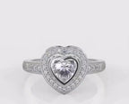 Direct top-down view of a 2 carat heart cut lab grown diamond engagement ring with bezel halo.