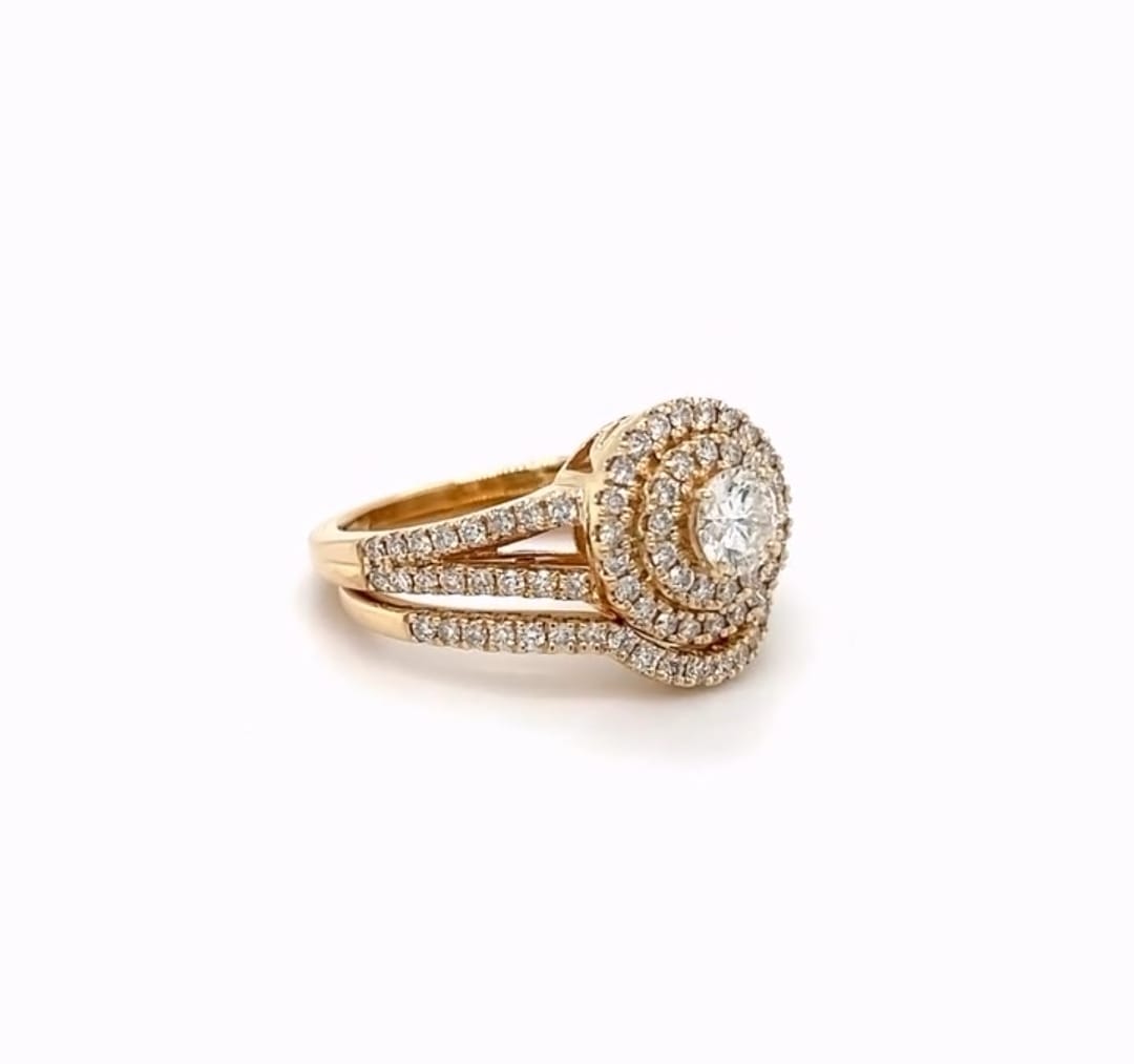 Perspective view showcasing the layered double halo and multi-row pave band on 1.5 CT round lab diamond set.