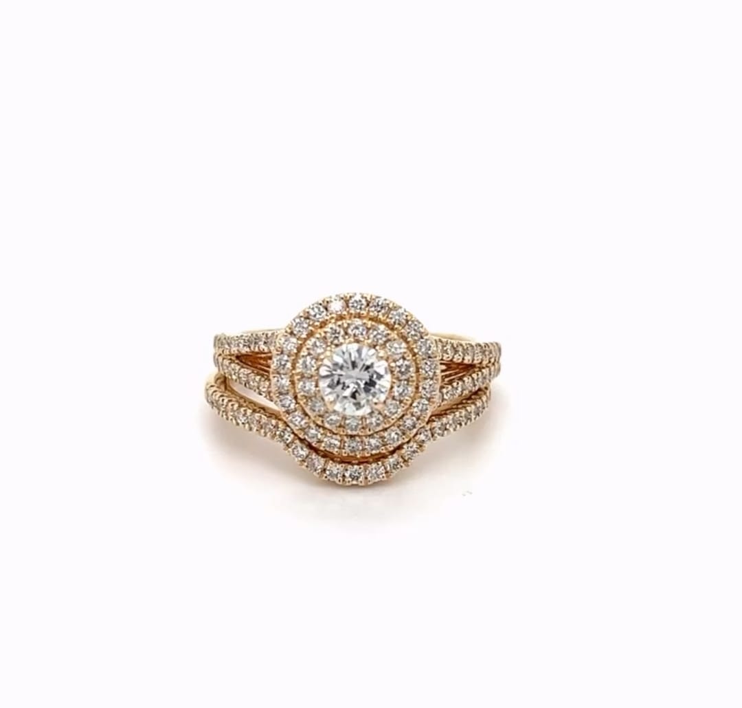 Top-down view showing center 1.5 CT round lab diamond surrounded by dual halos and split-shank diamond bands.
