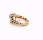 Profile view from the right side showing intricate head detail and triple row pave design of the gold bridal set.