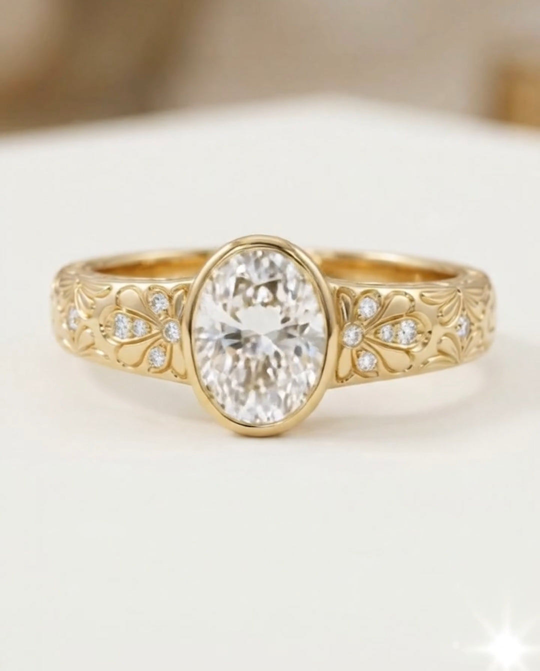 Detailed undergallery view of a gold oval engagement ring highlighting the open-work basket and smooth polished inner band