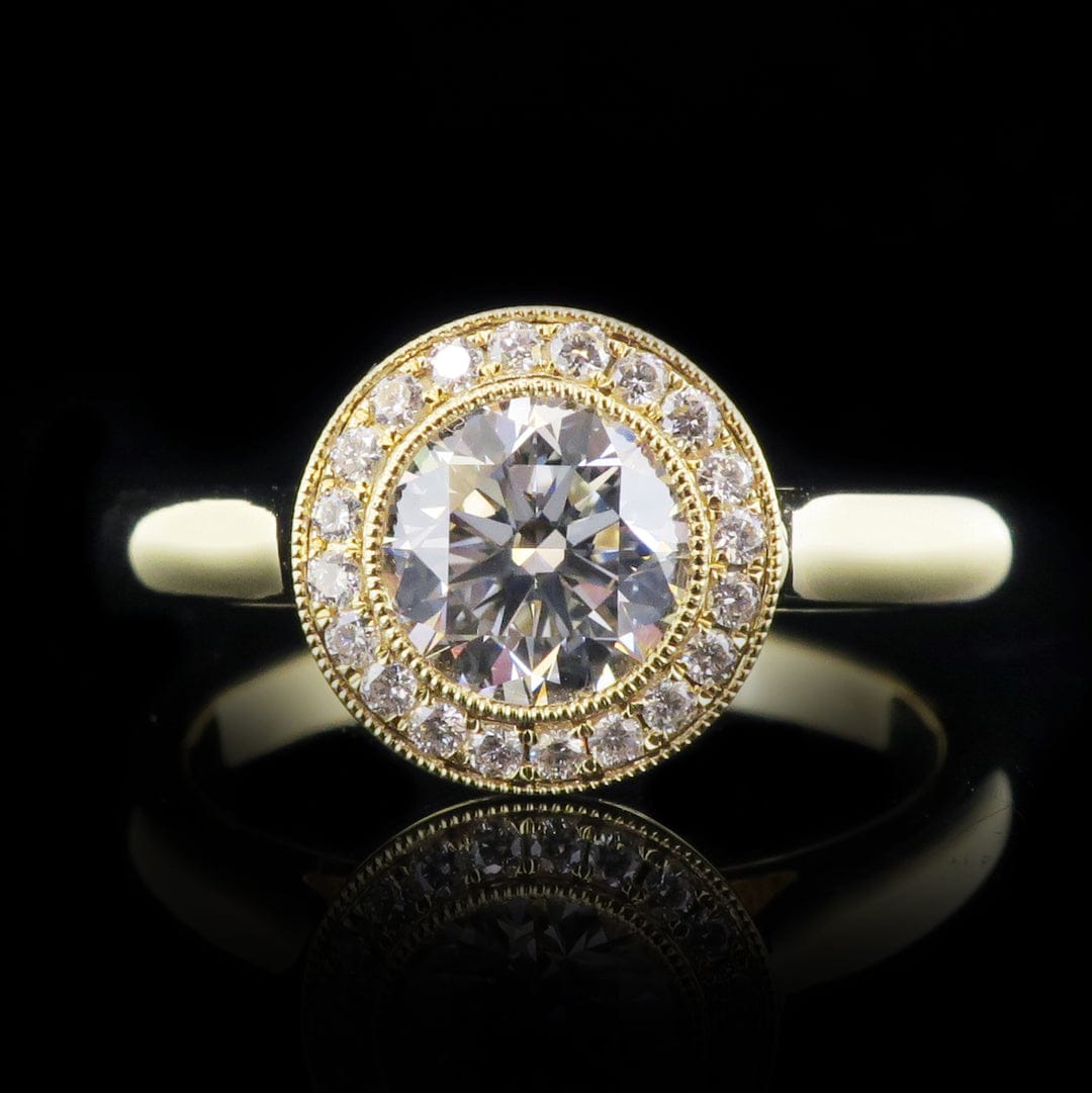 Close-up front view highlighting the brilliance and milgrain detail of a 2 carat round lab diamond halo ring