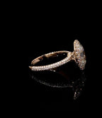 Side view showing side profile and pavé band of 3 CT oval lab grown diamond halo ring in rose gold