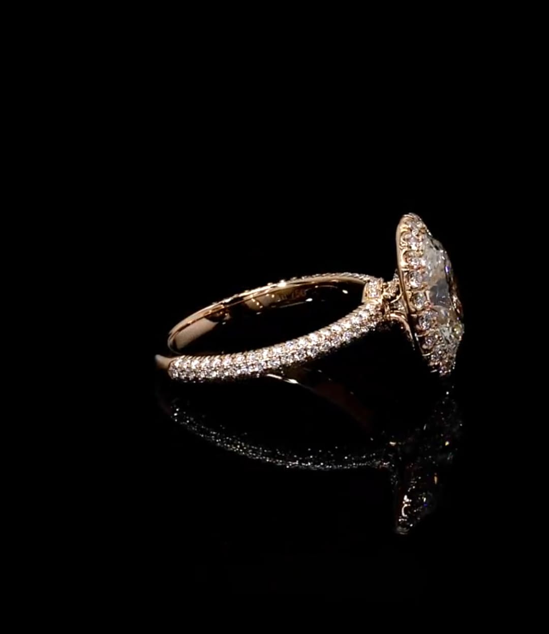 Side view showing side profile and pavé band of 3 CT oval lab grown diamond halo ring in rose gold