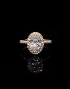 Top down front view of 3 CT oval cut lab grown diamond engagement ring with halo setting