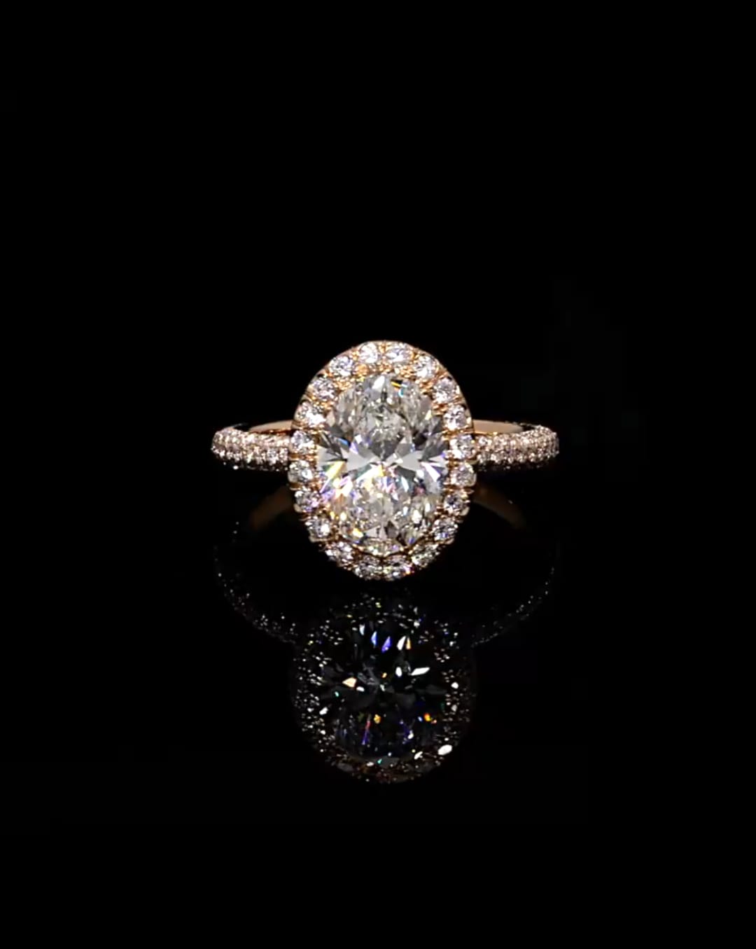 Top down front view of 3 CT oval cut lab grown diamond engagement ring with halo setting