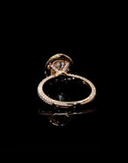 Underside gallery view detailing setting structure of 3 CT oval lab diamond ring in rose gold