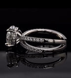 Side view showing hidden halo basket and split pavé band of 3 CT round lab diamond engagement ring