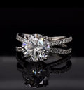 Top down front view showcasing the 3 carat round cut lab diamond and split-shank diamond band