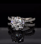 Top down front view showcasing the 3 carat round cut lab diamond and split-shank diamond band