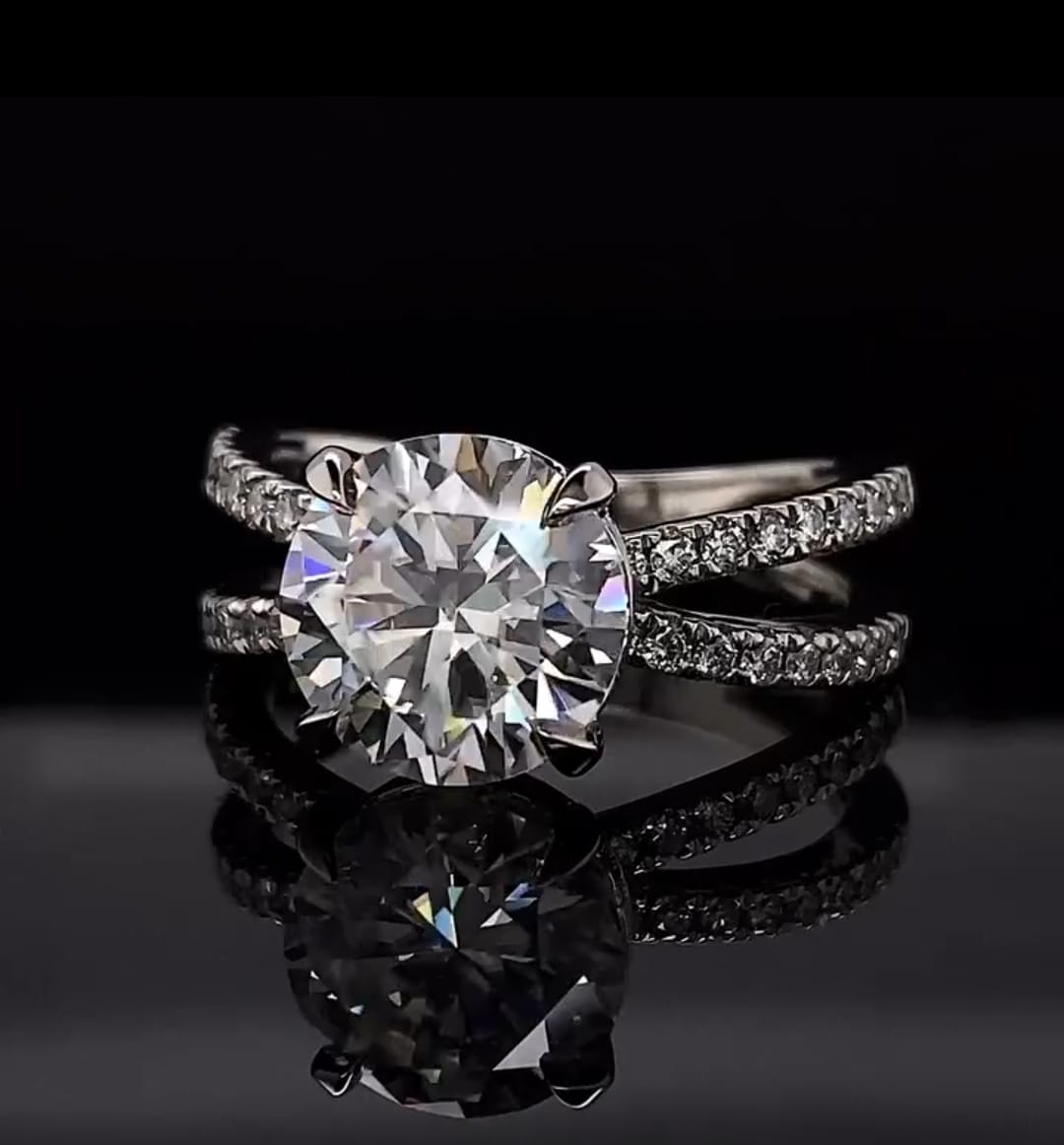Top down front view showcasing the 3 carat round cut lab diamond and split-shank diamond band