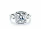 Top front view of 2 CT round cut lab grown diamond engagement ring with cushion halo