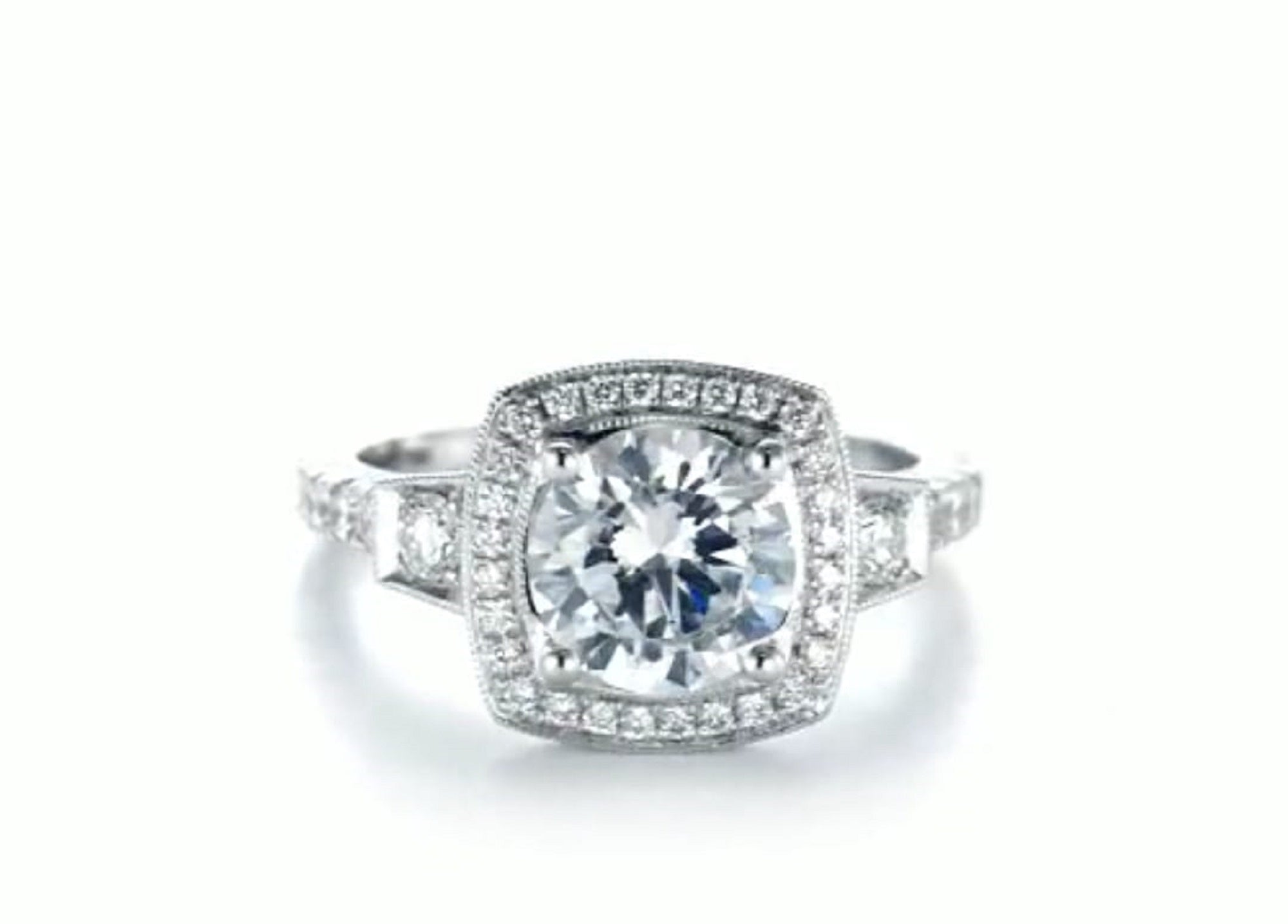Top front view of 2 CT round cut lab grown diamond engagement ring with cushion halo