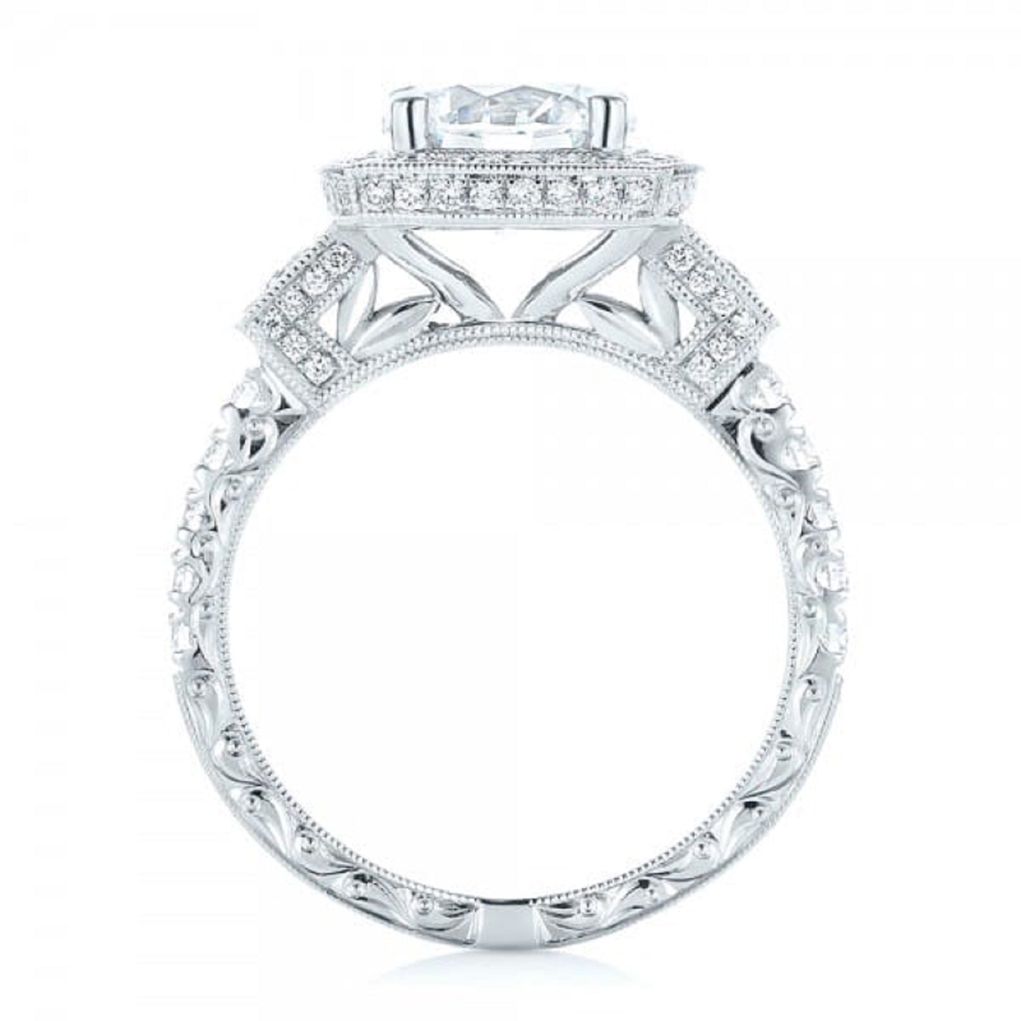 High-resolution studio profile view of vintage cathedral ring setting with filigree bridge