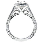 Side profile view highlighting intricate filigree scrollwork bridge and hand-engraved ring shank