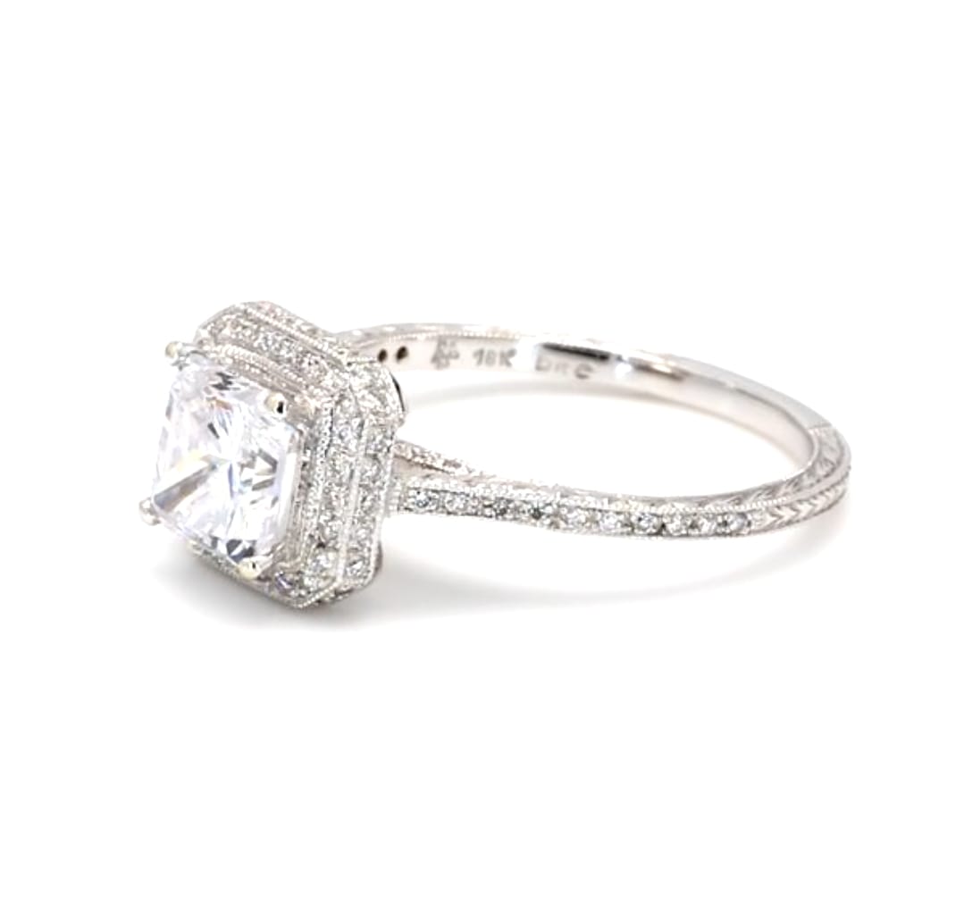 Side angle view of 2 carat princess cut lab grown diamond ring with micro-pave halo and engraved band