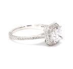 Three-quarter angle showing square halo and split cathedral pave band details