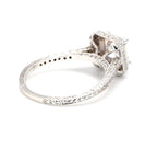 Side view focused on the hand-engraved scrollwork and milgrain edge along the white gold band