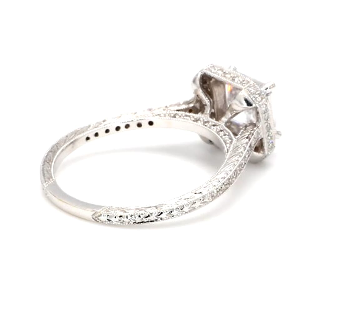 Side view focused on the hand-engraved scrollwork and milgrain edge along the white gold band