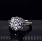 Three-quarter view of 3 carat round cut lab grown diamond ring with scalloped floral micro-pave halo