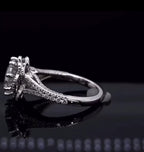 Low angle view of 3 CT round lab diamond engagement ring showing pave band and double halo construction
