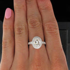 On-hand view of a 3 CT oval lab grown diamond engagement ring with vintage halo setting