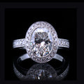 Front view showing brilliance of 3 carat oval lab diamond and micro-pave milgrain halo setting