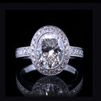 Front view showing brilliance of 3 carat oval lab diamond and micro-pave milgrain halo setting