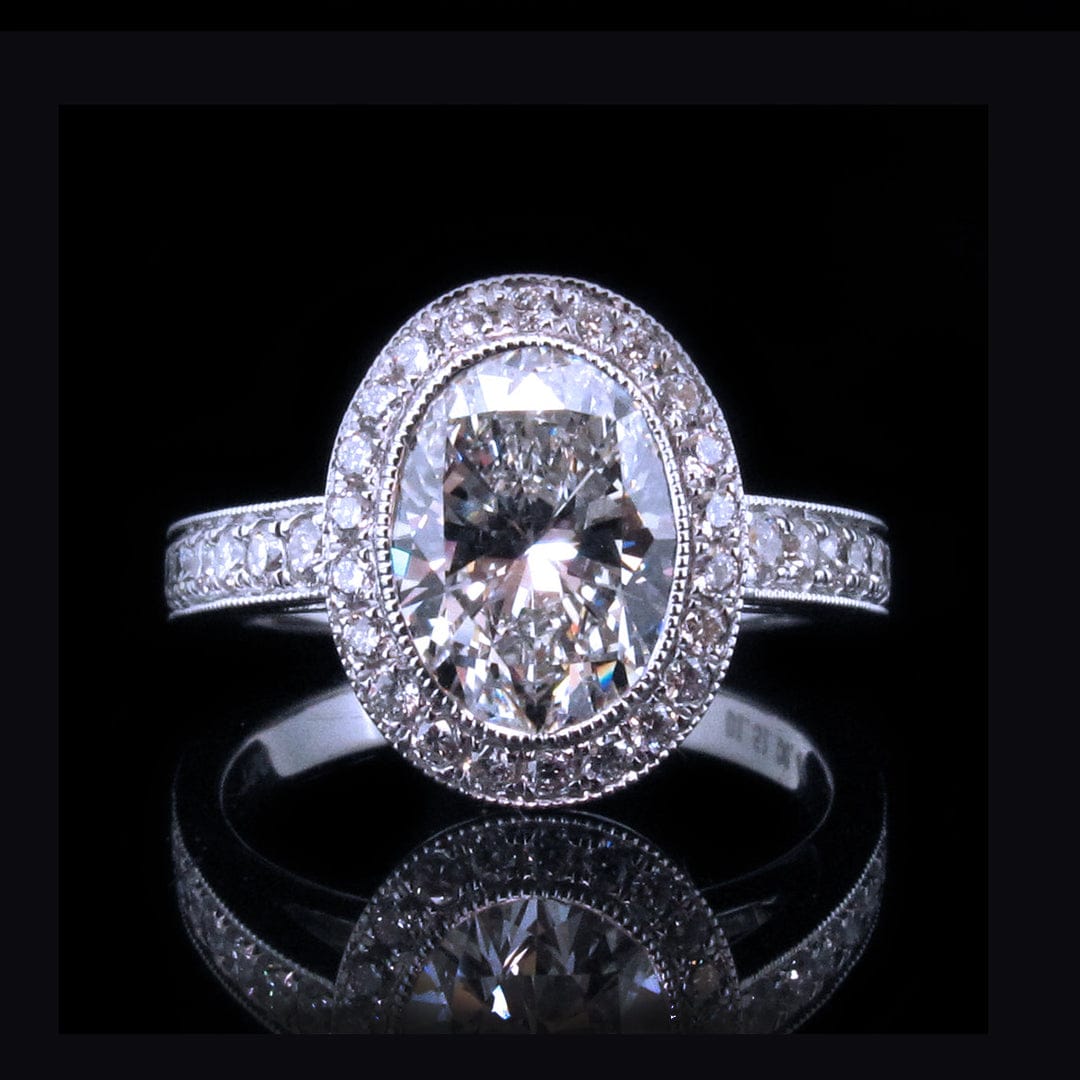 Front view showing brilliance of 3 carat oval lab diamond and micro-pave milgrain halo setting