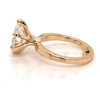 Side angle view showing polished yellow gold band and 6-prong head structure