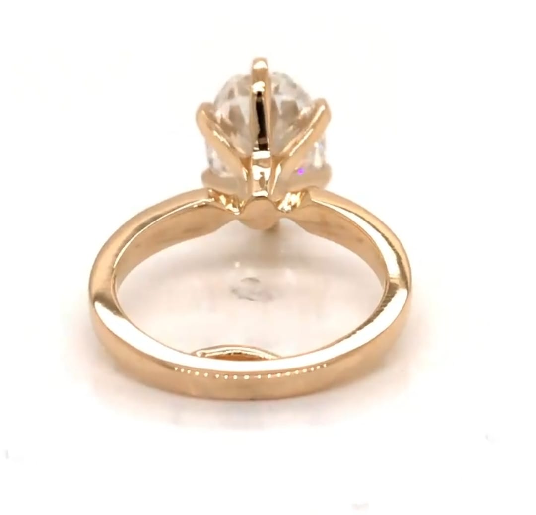 Straight-on side view of 3 CT oval lab diamond ring showing symmetry of the 6-prong setting