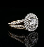 Side angle view of a 2 CT round lab grown diamond engagement ring with double halo and split shank band on a black background.