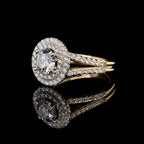 Perspective view showing the detailed pave split-shank band and double halo setting of a round lab diamond ring.
