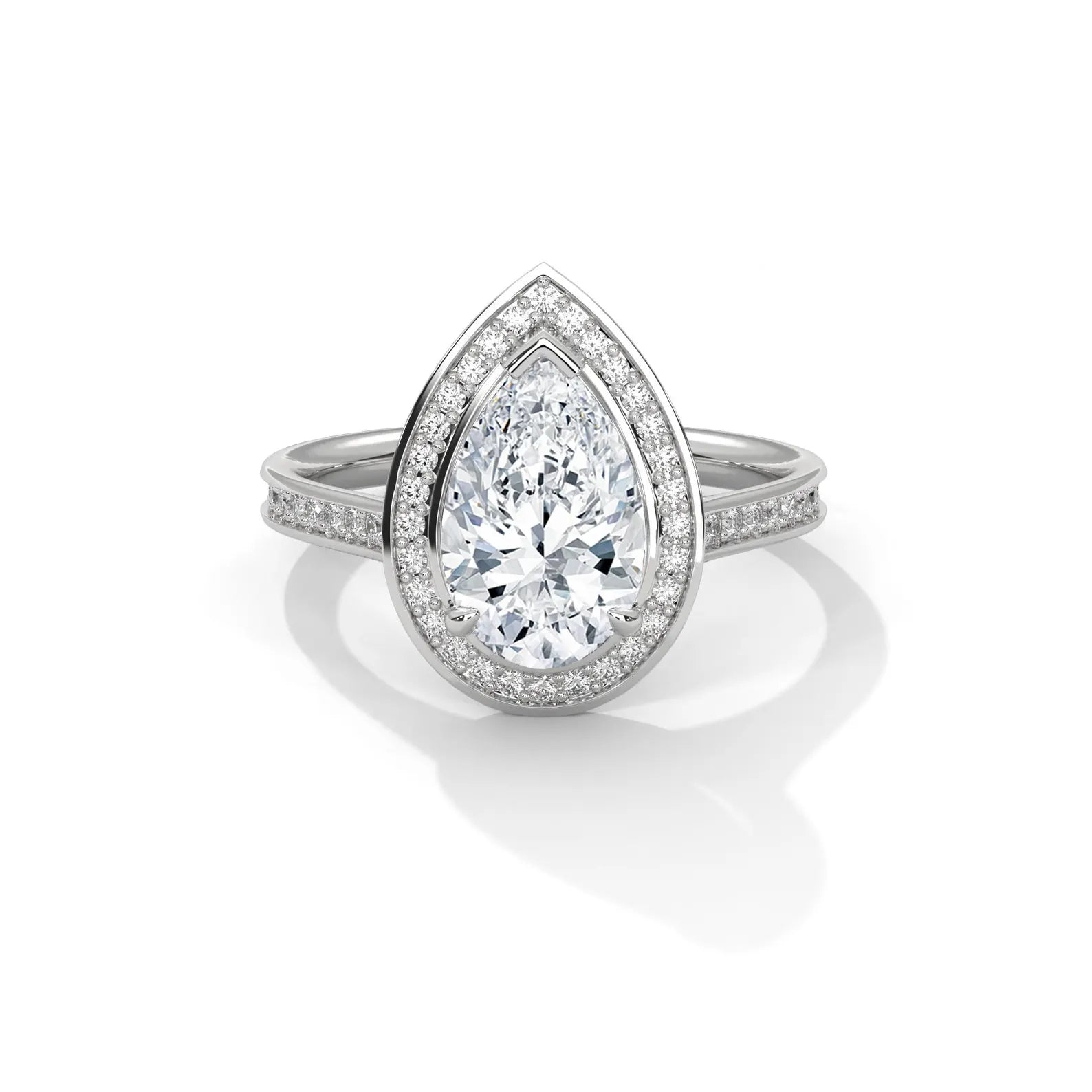 Top-down view of a 3 CT pear cut lab grown diamond halo engagement ring in white gold