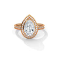 Front view of a 3 carat pear cut lab diamond engagement ring set in rose gold halo band