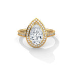 Top view of a 3 CT pear shaped lab created diamond ring with halo in yellow gold