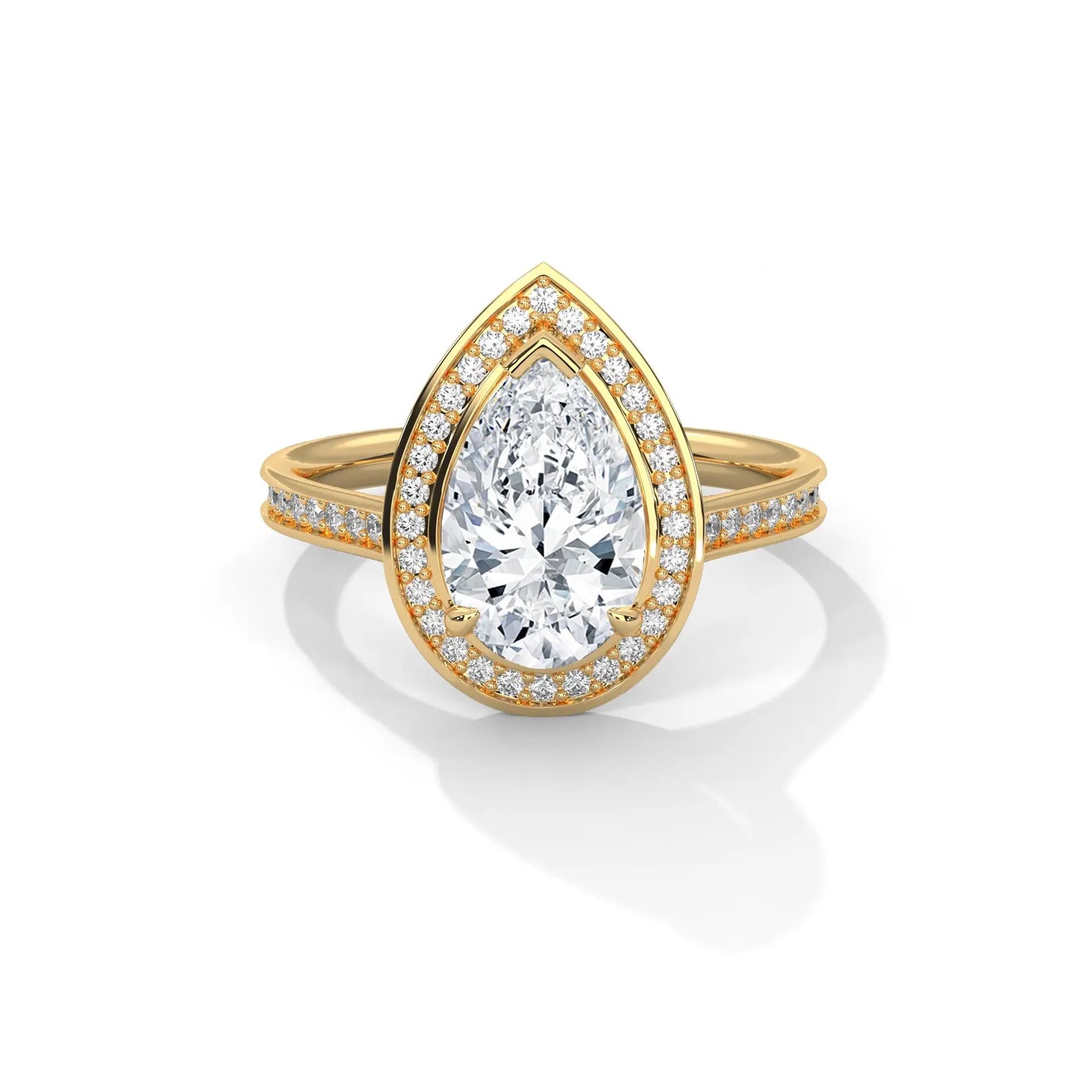 Top view of a 3 CT pear shaped lab created diamond ring with halo in yellow gold