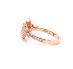 Side profile view of a rose gold vintage oval lab grown diamond engagement ring showing band detailing