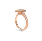 Side view profile of a 3 carat marquise cut lab grown diamond geometric halo ring in rose gold with milgrain band