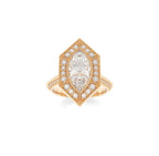 Top-down view of a 3 CT marquise lab diamond ring in yellow gold with an Art Deco hexagon halo setting