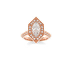 Front top-down view of a 3 carat marquise lab created diamond engagement ring in rose gold with geometric halo